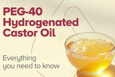 Tekst "PEG-40 Hydrogenated Castor Oil" nad miseczką z żółtym żelem. Dowiedz się wszystkiego o tym składniku.
