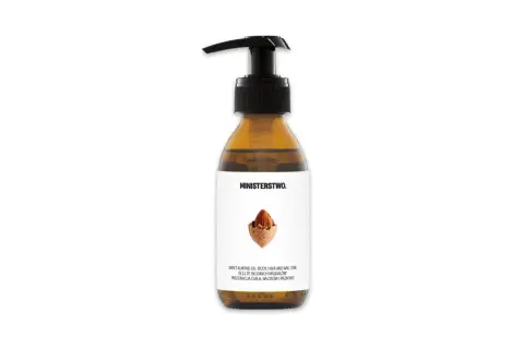 Bursztynowa butelka z pompką zawiera olej ze słodkich migdałów (prunus amygdalus dulcis oil) do pielęgnacji ciała, włosów i paznokci.